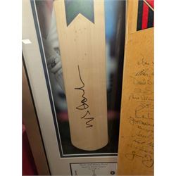 Signed England and Yorkshire cricket memorabilia, including framed bat signed by Michael Vaughn, signed photograph of England team, signed Yorkshire shirt and a signed bat