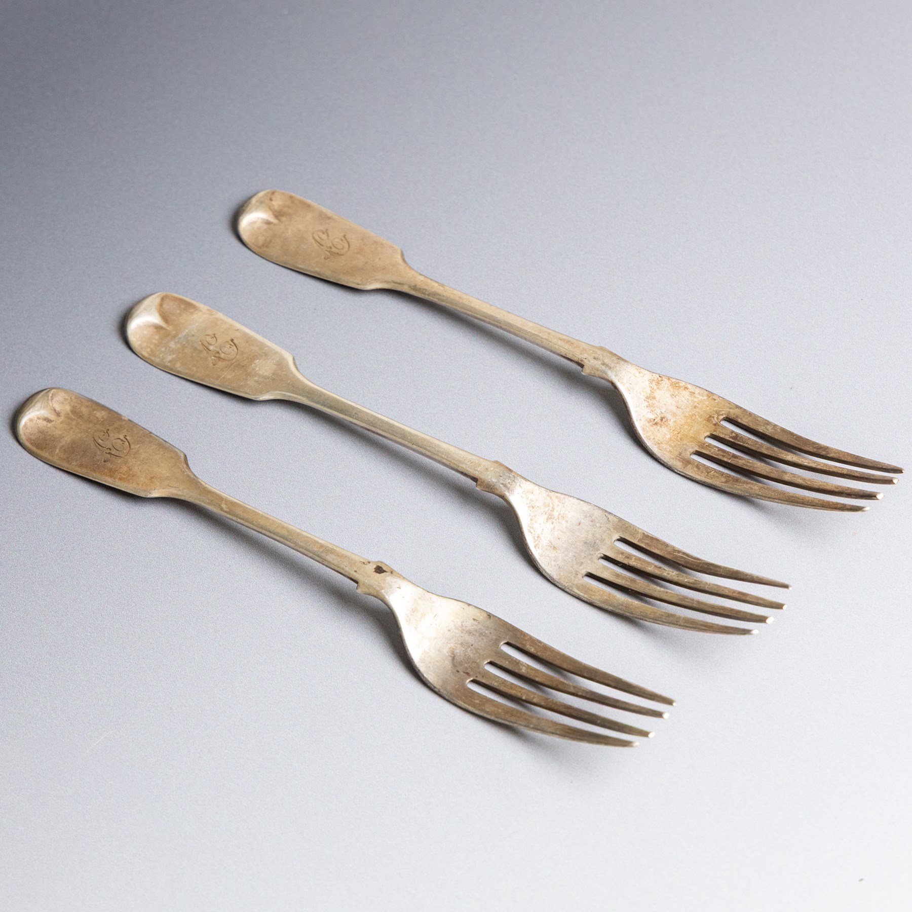 Collection of silver flatware, comprising set of six Georgian teaspoons, three Victorian Exeter silver dessert forks, Georgian Old English pattern table spoon, etc all hallmarked