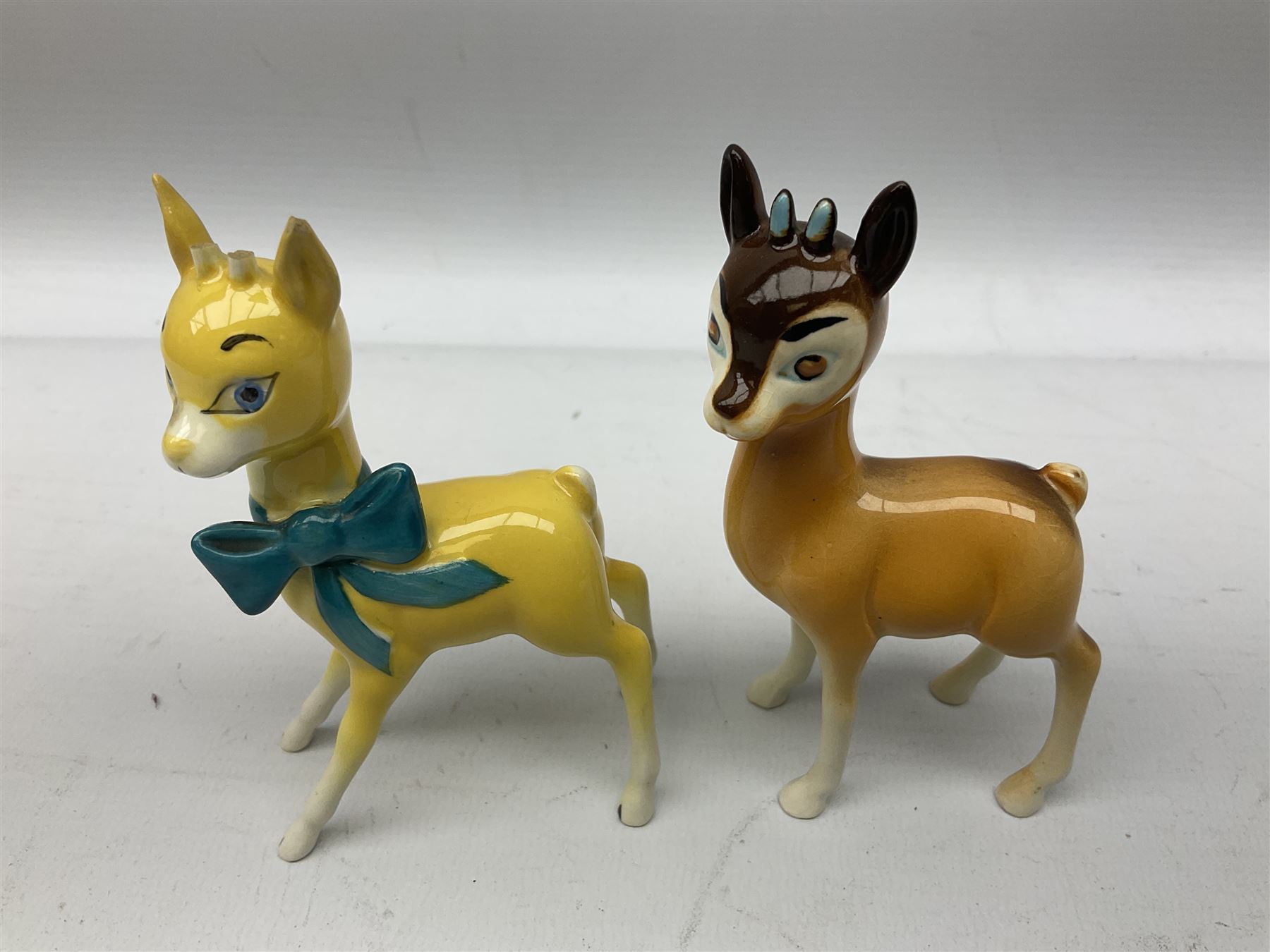 Collection of Beswick figures to include Beatrix Potter Squirrel Nutkin, Jemima Puddleduck, Spike and Tyke, Tom and Jerry, both boxed and with certificates, Chamois 1551 and Babycham 1615a (a/f) Beswick Ware Royal Douton Peter Rabbit and Benjamin Bunny, with certificate
(9)
