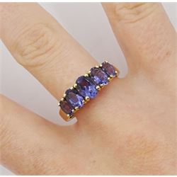 9ct gold five stone graduating oval tanzanite ring, hallmarked 