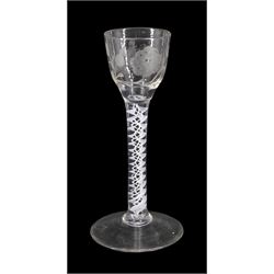 18th century drinking glass of possible Jacobite interest, the ogee bowl engraved with carnation and bee, upon a double series opaque twist stem and conical foot, H16cm