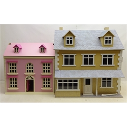  Two wooden dolls houses, H71cm max, some dolls house furniture and a metamorphic high chair   