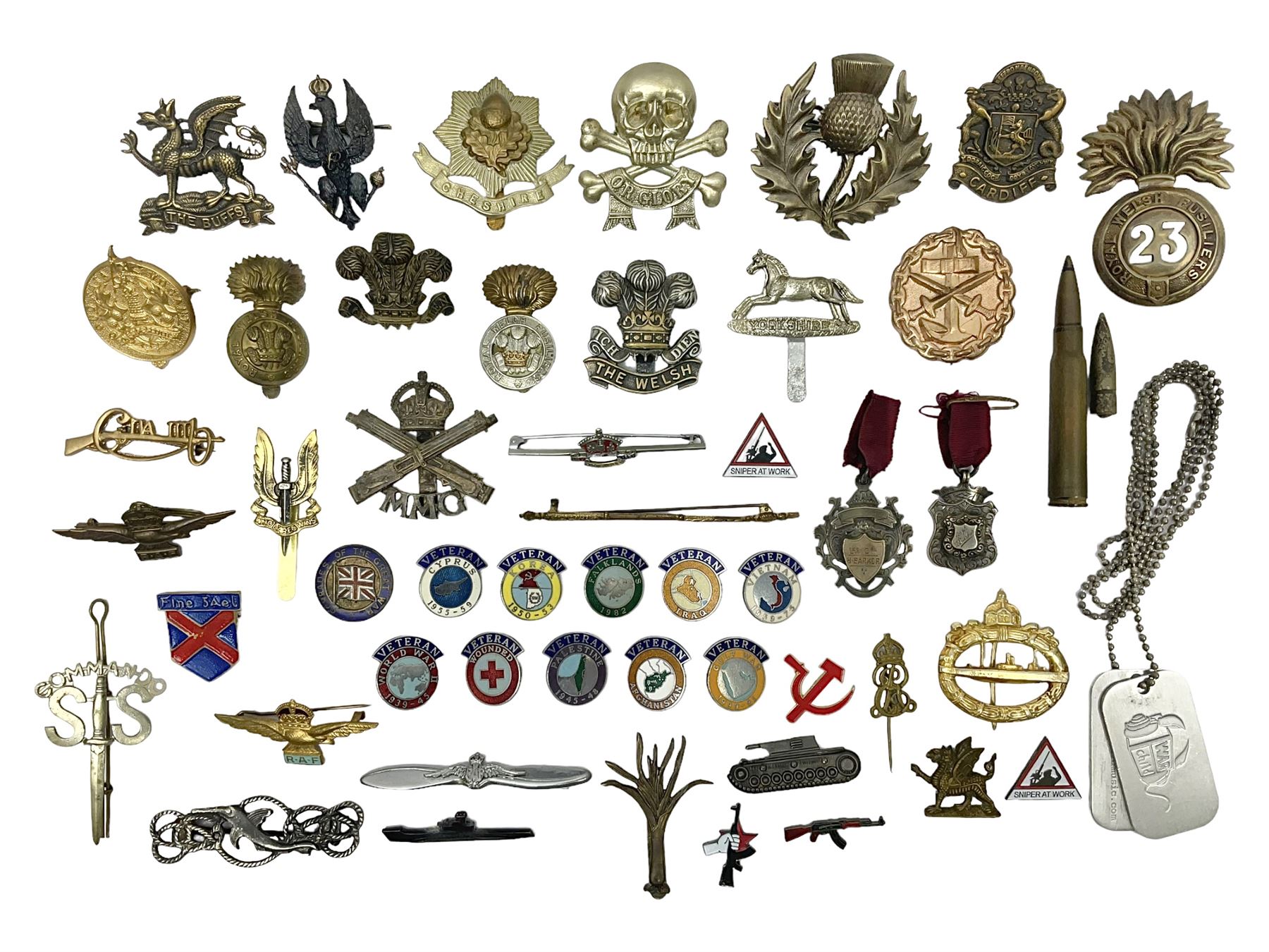 Two Edwardian hallmarked silver presentation fobs for military bugling competitions; and quantity of cap/glengarry and other badges, sweetheart brooches etc