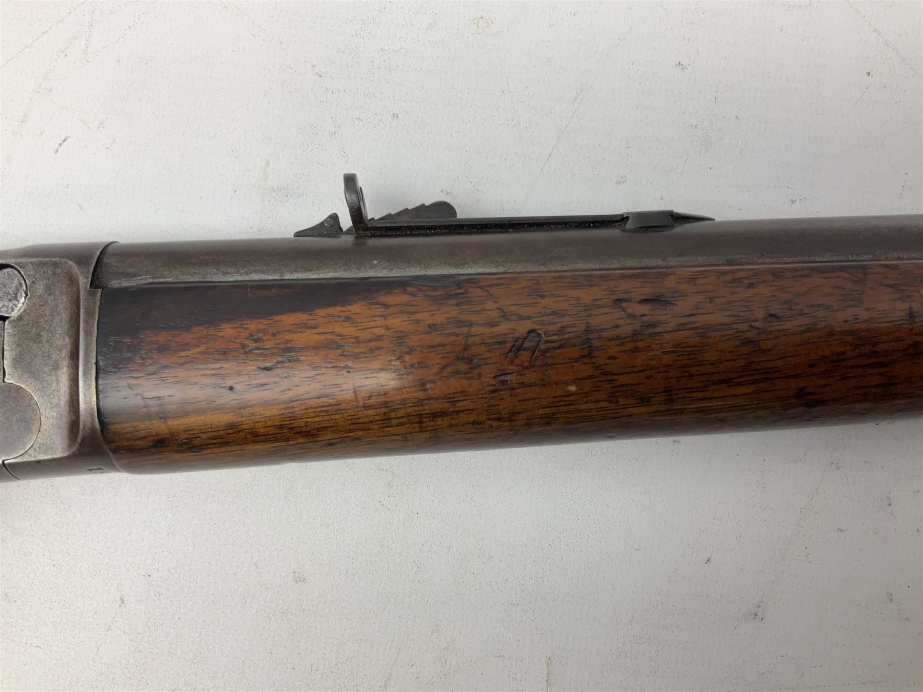 Marlin Firearms Co. USA 'Safety' .32 rim-fire rifle dated 1892, the 61cm barrel with magazine tube under, walnut stock with under lever cocking and crescent butt plate, serial no.153534, L103.5cm
