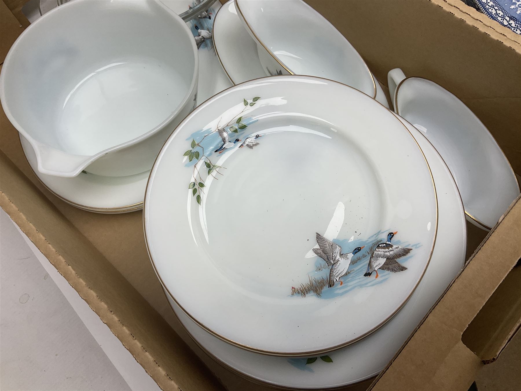 Maling Maltese pattern part dinner wares, including dinner plates, tureens, side plates etc, together with Pyrex dinner wares, decorated in flying duck pattern, Johnson Bros Indian Tree pattern tea and dinner wares and a collection of decorative and calendar plates, etc, in six boxes 