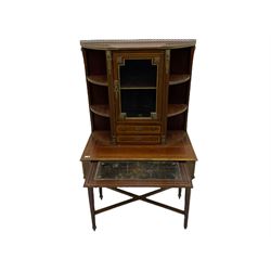 French Empire style walnut cabinet on stand, the raised cabinet over two small drawers and flanked by two curved shelves, the rectangular top over slide and drawer, on turned and fluted supports joined by x-framed stretcher, boxwood and brass stringing throughout, fitted with cast gilt metal mounts and fittings