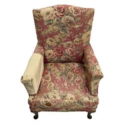 Early 20th century beech framed upholstered wing back armchair 