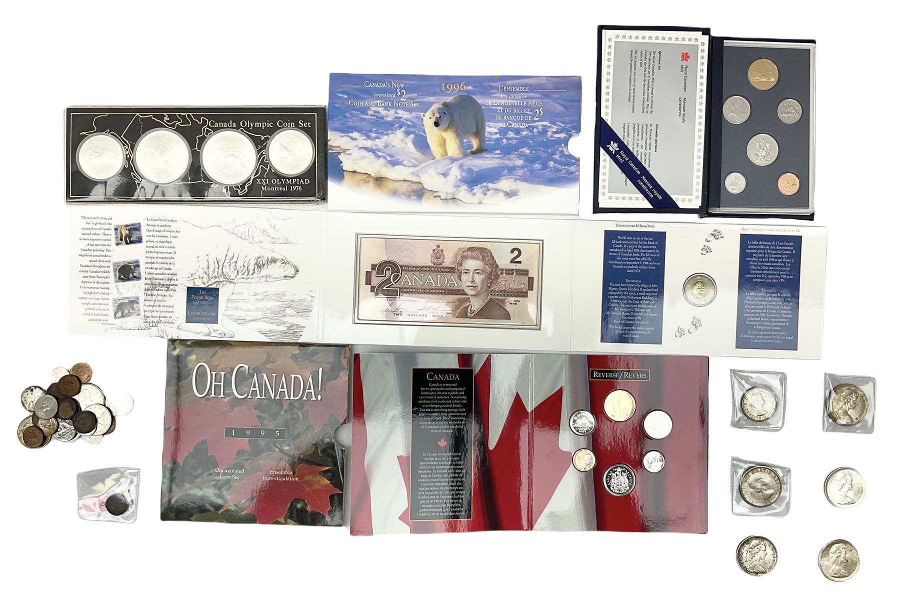 Canadian coinage including Queen Elizabeth II 1964 and four 1966 dollars, 1975 Olympic four coin set comprising two five dollar and two ten dollar coins, 1995 specimen coin set in blue folder, 1995 uncirculated coin set etc 