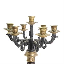 Pair of 20th century Corinthian column seven branch candelabra, with gilt brass sconces and swept acanthus leaf pedestal bases, H69cm (2)