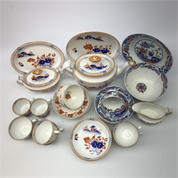 Early 19th century Spode Dolls House pattern tea wares, comprising teapot, twin handled sucrier and cover, milk jug, five teacups, two coffee cans, six saucers, stand, and shallow dish, decorated with a house and flowers in blue and orange, a number of pieces marked with pattern number 488, together with a quantity of other 19th century tea wares. 