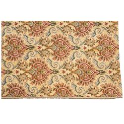 Pale golden ground chenille fabric section, decorated with repeat stylised plant motifs and trailing scrolls