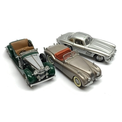 Two Franklin Mint die-cast models compri