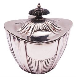 Edwardian silver tea caddy, of tapering oval part fluted form, the hinged cover with ebonised finial, hallmarked Horace Woodward & Co, Sheffield 1905, H10cm, approximate weight 6 ozt (186.5 grams)