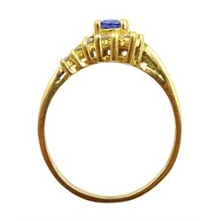 18ct gold oval sapphire ring with round brilliant cut diamond crossover shoulders, hallmarked