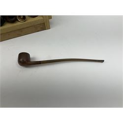 Pipes and two tiered wooden rack together with eleven pipers, including briar pipe carved as a wolf, Sea Dog straight pipe, John Brumfit pipe, meerschaum pipe ect, pipe rack H29.5cm