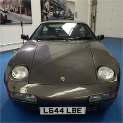 1991 Porsche 928 S4 Automatic Coupé

Registration: L644 LBE
Date of first registration as shown on V5: 1 July 1994
Porsche year of manufacture: 1991
Engine: 5.0-litre V8 petrol
Transmission: Automatic
Odometer reading: 37,886 kilometres (approximately 23,541 miles)
Colour: Slate Grey metallic
Interior: Black leather
V5C: Present
Keys: One
Chassis number: WP0ZZZ92ZMS800460

An exceptional Porsche 928 S4 Automatic Coupé finished in Slate Grey metallic with a black leather interior. The car displays a notably low odometer reading of just 37,886 kilometres, equivalent to approximately 23,541 miles.

The 928 S4 combined Porsche’s powerful 5.0-litre V8 engine with a sophisticated rear-mounted transaxle, creating a refined and accomplished grand tourer. This example is equipped with automatic transmission, electrically adjustable front seats, air conditioning, alloy wheels and the characteristic rear spoiler.

The car was purchased from Specialist Cars of Malton in June 2019, at which time the recorded mileage was 36,650 kilometres. The accompanying service record includes evidence of a cam belt replacement.

Presented in excellent condition throughout, the bodywork and metallic paint finish appear particularly well preserved, while the cabin retains its original character with black leather upholstery and 928-branded sill trims. A Japanese Porsche service label records maintenance entries at 31,902, 33,397 and 34,134 kilometres.

The car also features a Porsche Classic Communications Management (PCCM) upgrade system.

Features

• 5.0-litre V8 petrol engine
• Automatic transmission
• Slate Grey metallic paintwork
• Black leather interior
• Electrically adjustable front seats
• Air conditioning
• Porsche alloy wheels
• Rear spoiler
• Right-hand drive
• Odometer reading of 37,886 kilometres, approximately 23,541 miles
• Purchased from Specialist Cars of Malton in June 2019
• Recorded at 36,650 kilometres when purchased
• Service record showing cam belt replacement
• Japanese Porsche service label
• V5C present
• One key

This vehicle forms part of the Estate of the Late John Sils and is offered for sale by the Executors, confirming a genuine reason for sale.