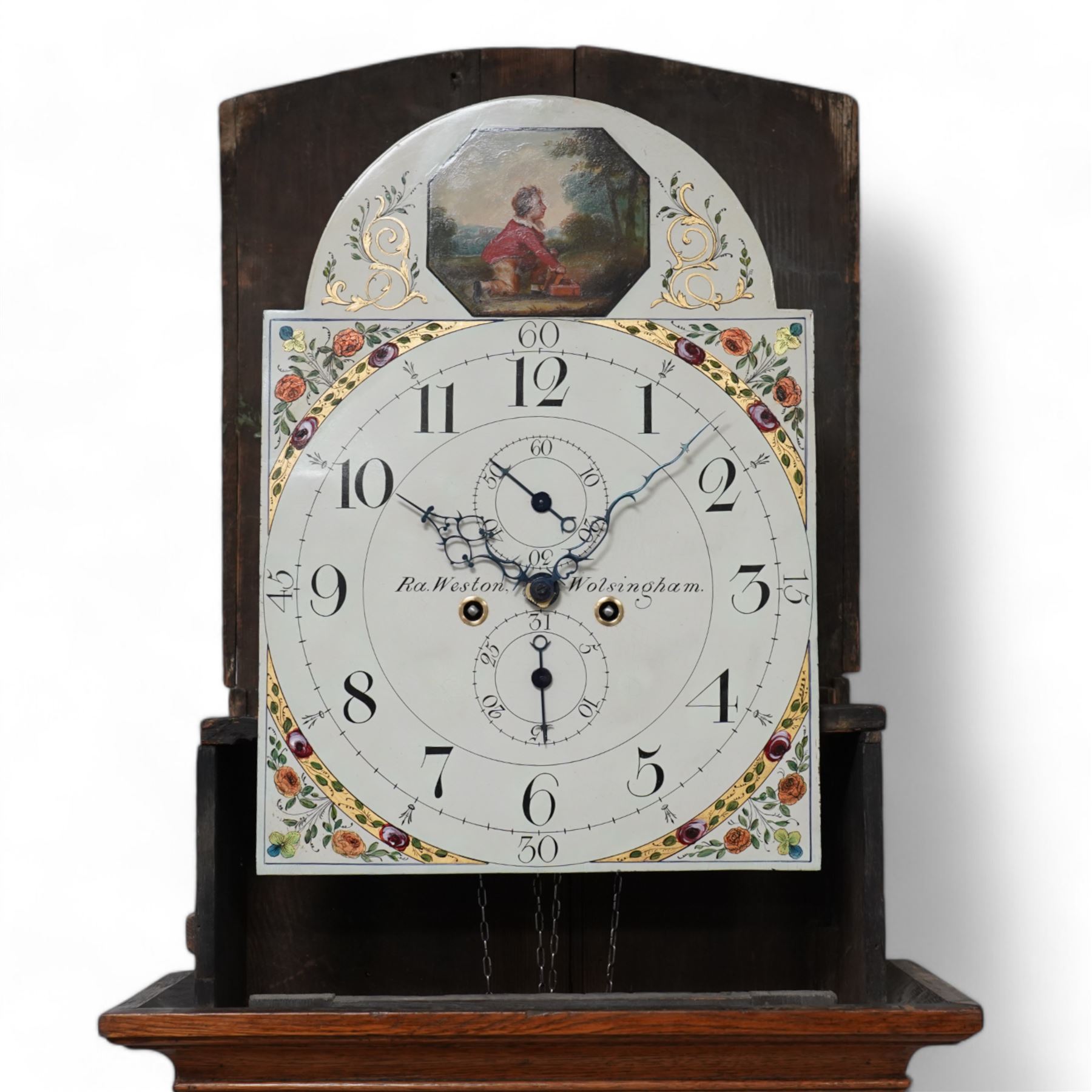 Ralph Weston (III) of Wolsingham (Co Durham) - 30-hour oak and mahogany longcase clock c1815-17, With a swan necked pediment, brass parterre and central spire finial, break arch hood door beneath flanked by reeded pilasters with brass capitals, trunk with recessed reeded pilasters and a crossbanded door with a concave top, square plinth on bracket feet, painted dial with floral depiction to the spandrels and a depiction of a boy attempting to catch birds in the arch, with makers name, Roman numerals, five minute Arabic's, minute track and matching steel hands, with dummy seconds and calendar dials and dummy winding arbors, dial pinned via a cast falseplate by Whittaker & Shreeve to a countwheel striking chain driven movement striking the hours on a bell. With weight and pendulum.
Notes.
The Weston family were a prodigious three generation family of 18th and 19th century Wolsingham clockmakers, all christened Ralph. The maker of this clock Ralph (III) frequently made 30hr clocks such as this possessing features normally found on  8-day clock dials.
Both the clockmaker, clock and dial were the subject of a comprehensive five part article in CLOCKS magazine published between  Nov 2012 and March 2013. The dial of the clock being of particular interest, manufactured by the Haifax firm of Shreve and Whittaker between 1815-17 . 
William Shreeve, a highly respected and competent dial painter went into a short-lived partnership with William Whittaker in 1815, however in 1817 Shreeve died in a tragic accident whereby he was burnt to death whilst preparing some of his own paints and varnishes. 

