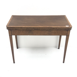  Early 19th century cross banded and inlaid mahogany fold over card table, green baize lined interior, square tapering supports, W92cm, H71cm, D91cm  