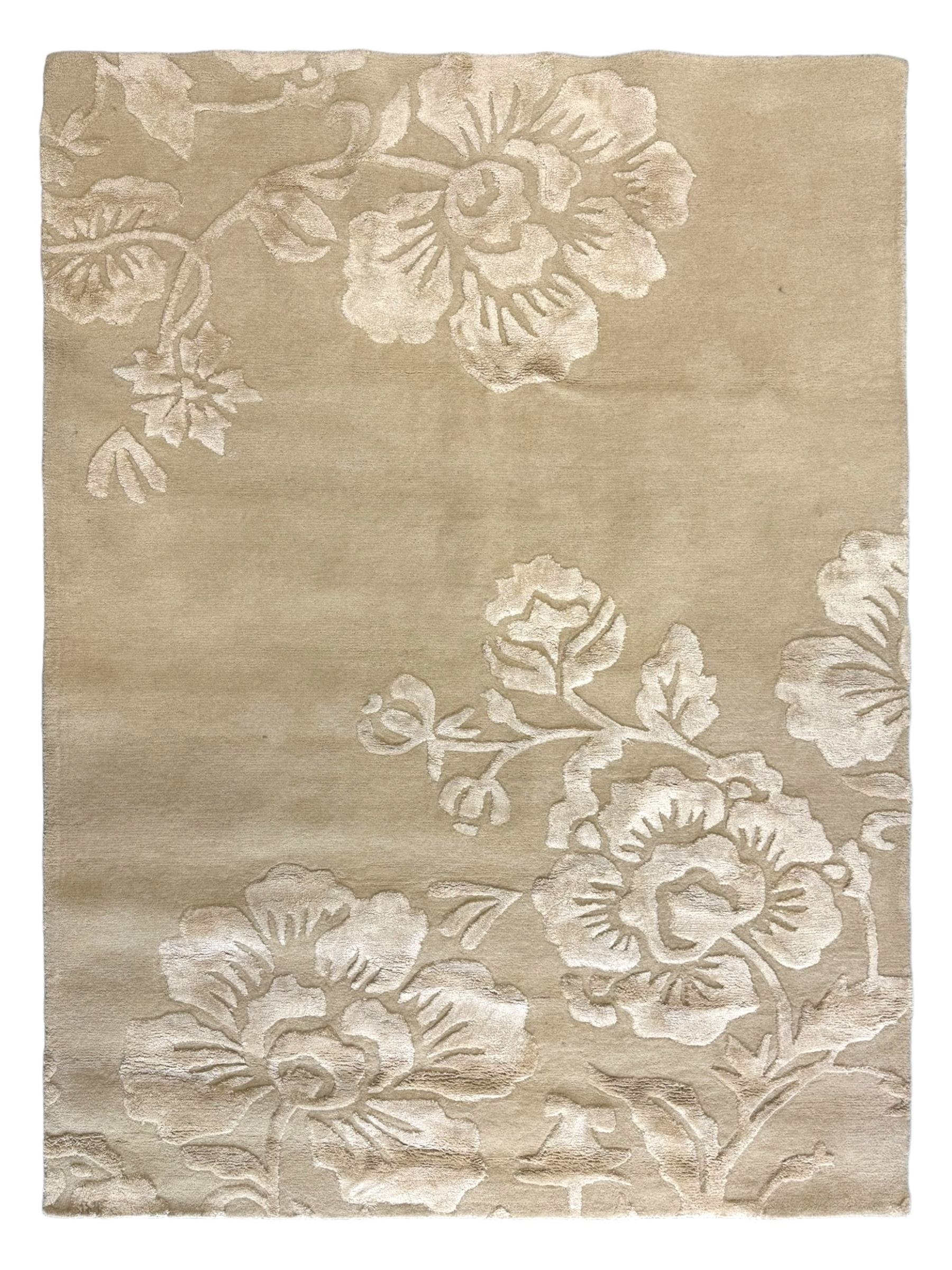 Laura Ashley - India made Claverton ground rug, monochromic taupe ground with relief floral motifs in a soft cream shade