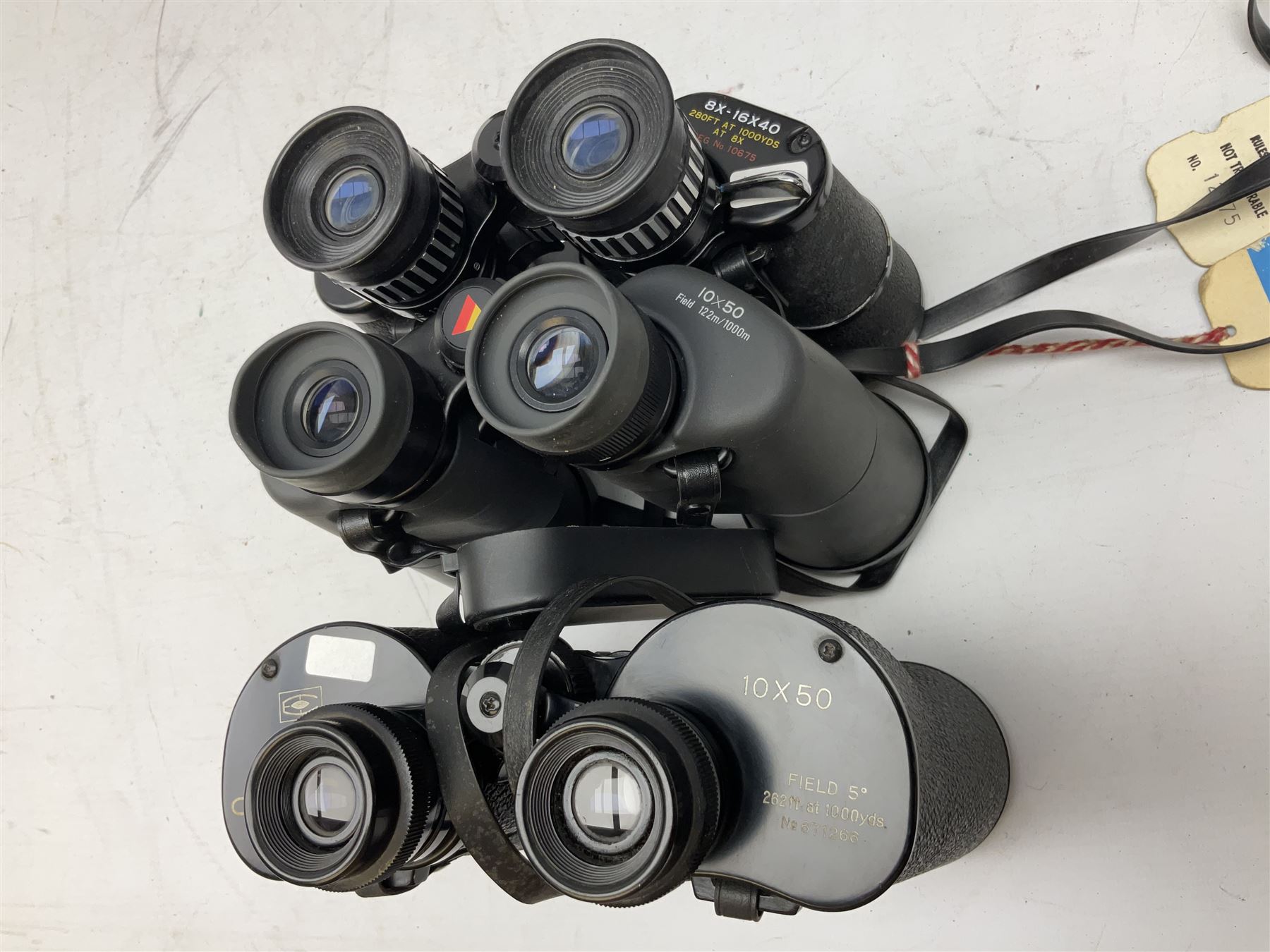 Eleven cased pairs of binoculars to include Summit 8x30,  Concord 8x40, Tasco no. 106 8x - 16x40, Chinon 10x50, Tokina 7x42 Field, Zoom 6x- 12x32 etc