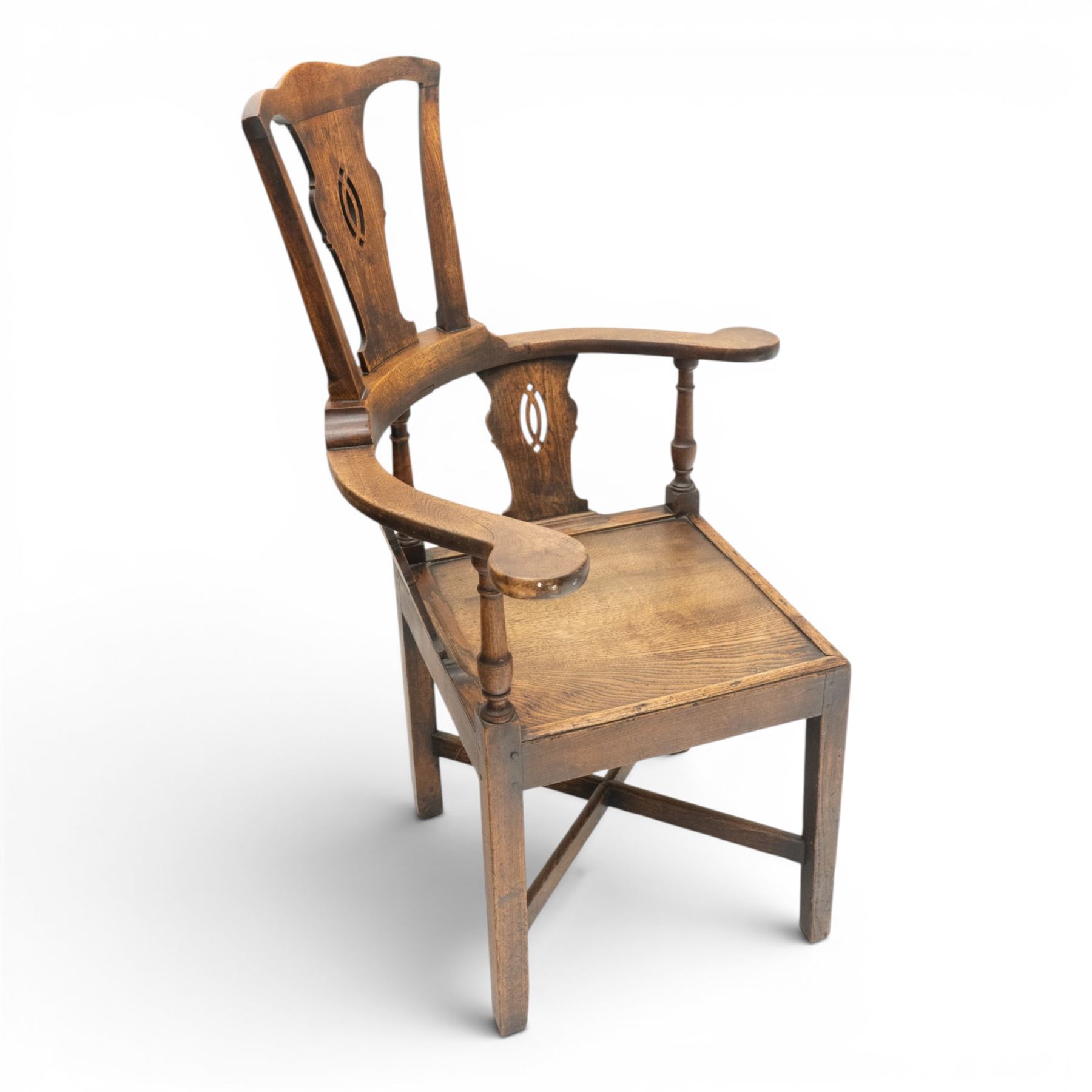 19th century elm high-backed corner chair, shaped cresting rail over three pierced vasiform splats and out-swept arms, square panelled seat over square supports united by X-stretcher