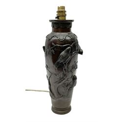 20th century Japanese bronzed table lamp of of tapered cylindrical form, decorated in relief with birds upon blossoming branches, H38