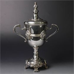 Mid 20th century silver twin handled trophy cup and cover, the bowl with central mask moun...