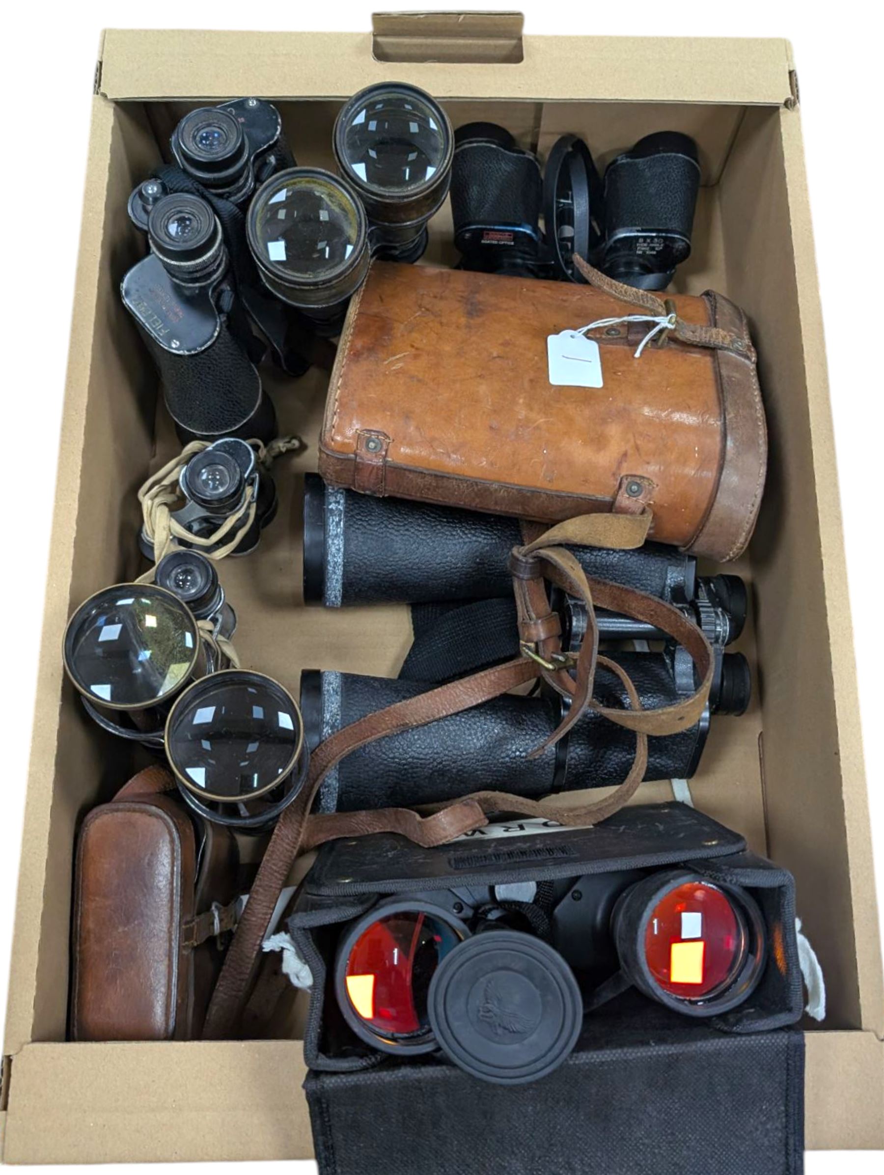 Nine pairs of early 20th century and later binoculars, including Tento 20x50, Nagoya Panoramic 8 x 30, Orr & Sons Madras, DRW 10 x 50, etc some with cases