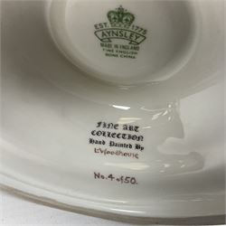 Aynsley twin handled racing cup and cover, to commemorate 'The Golden Jubilee of the Revival of The Yorkshire Cup', the handles inscribed '1927' and '1977', the green body painted by E. Woodhouse with Joe Childs up on Trimdon, the reverse with the winners, the domed cover with a Yorkshire rose finial, limited edition no. 4 of 50, on hexagonal wooden base with certificate, H34cm