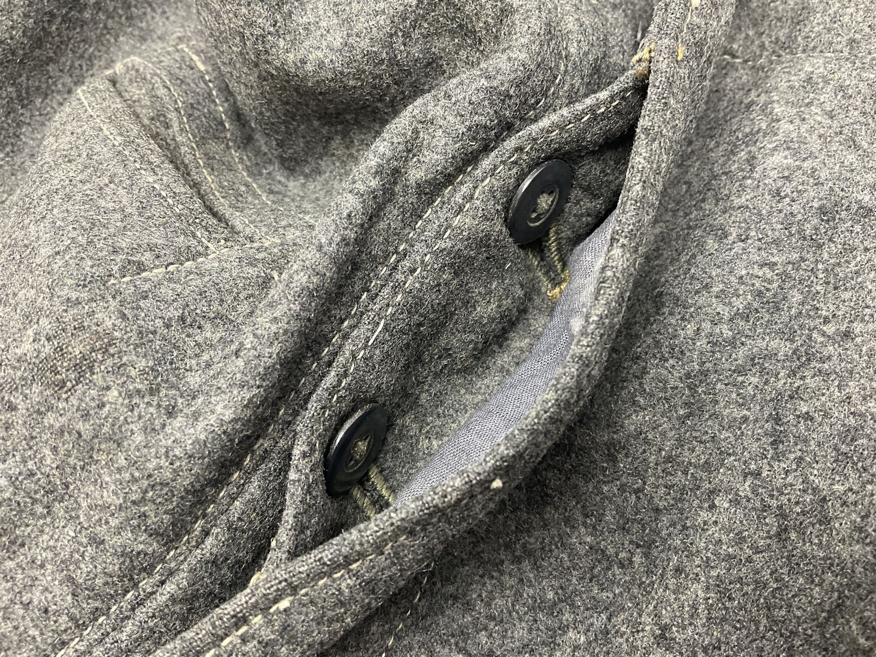 Pair of WW2 German Other Ranks trousers c1940-42, stamped C.& A. Brenninkmeyer Workstatten; WW2 German Army webbing belt with steel 'Gott Mit Uns' buckle; and WW2 German leather belt with 'Stahlhelm' (Steel Helmet League) members buckle (3)