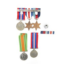 Trio WWII medals comprising 1939-45 Star, French and German Star and War Medal on medal bar, together with Defence Medal and War Medal