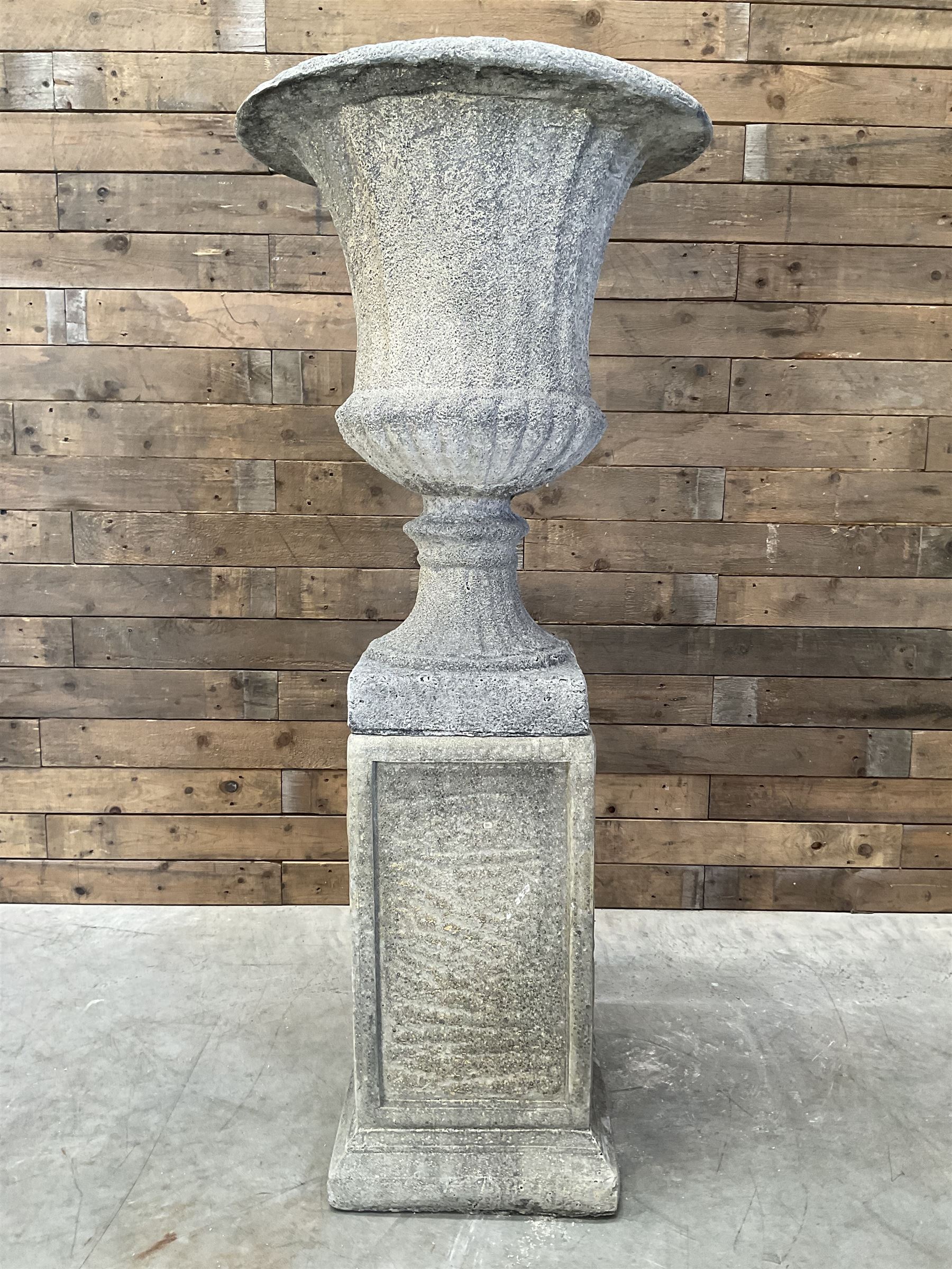 Large Georgian design cast stone garden centre-piece urn, egg and dart border, tapering column on square base, raised on square column