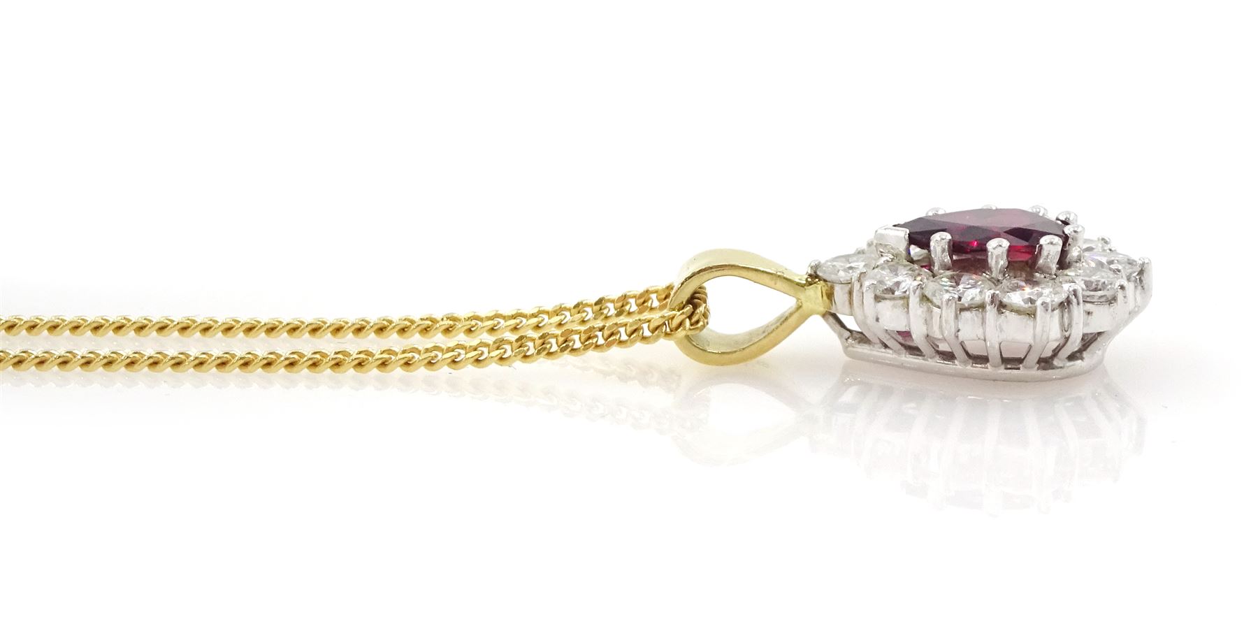 18ct gold pear cut ruby and round brilliant cut diamond pendant necklace, hallmarked, ruby approx 0.45 carat, total diamond weight approx 1.00 carat