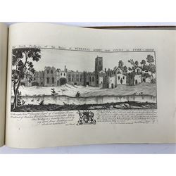 Samuel Buck: Ruins, Abbeys and Castles of Yorkshire. Bound collection of twenty-five engraved views dated 1720 - 1728 including Burstal Abbey Hull, Bolton Abbey, Whitby Abbey, Scarborough Castle, Malton Priory etc and list of subscribers; oblong folio; mottled half leather and suede binding by Etherington, Thorpe & Co., Pudsey