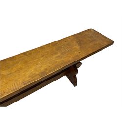 Gnomeman - adzed oak narrow bench, rectangular seat on shaped end supports united by pegged stretcher, carved with gnome signature, by Thomas Whittaker, Little Beck 