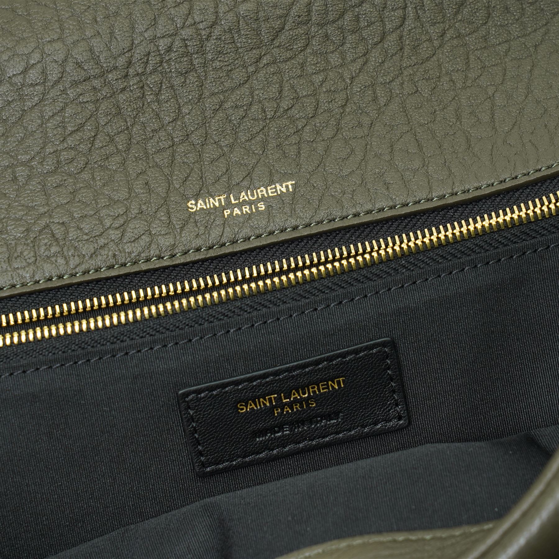 Yves Saint Laurent Calypso large shoulder bag, grey grained leather with envelope flap and gold-tone Cassandre monogram, sliding chain and leather shoulder strap, magnetic fastening, interior lined in black textile with zip pocket and leather brand tab stamped Saint Laurent Paris, made in Italy, together with original Saint Laurent dust bag, W37cm D10cm H22cm