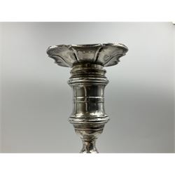 Pair of late Victorian silver mounted candlesticks, each of knopped and part fluted form, upon square stepped base with anthemions to each corner, with conforming sconces, hallmarked to removable sconces and foot, Thomas A Scott, Sheffield 1901, H25.2cm
