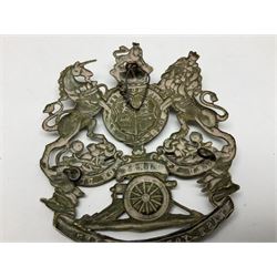 Artillery helmet plate, queen's crown crest, the bottom ribbon marked 'East York Artillery' with three fixing eyes verso H10cm