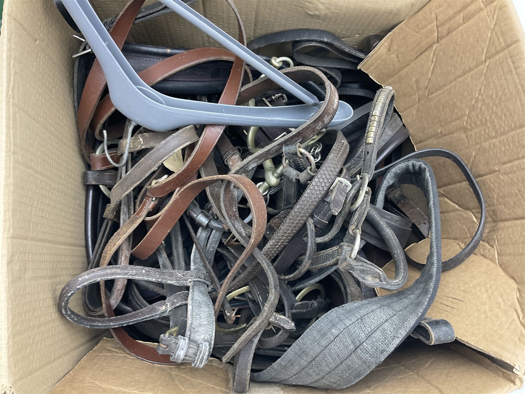 Quantity of horse tack and equipment to include Hauptner electric horse clippers, The Horseman Electric Clippers, bits, bridles, girths, rugs, jodpa boots etc  