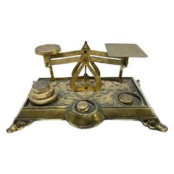 Victorian brass postal scales with ornate foliate and floral decoration, L20cm