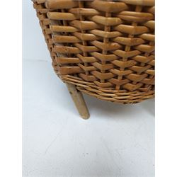 Pull along wicker basket on wheels, with cane handle, together with a silver mounted wooden umbrella and a one other umbrella, basket inlcuding handle H103cm