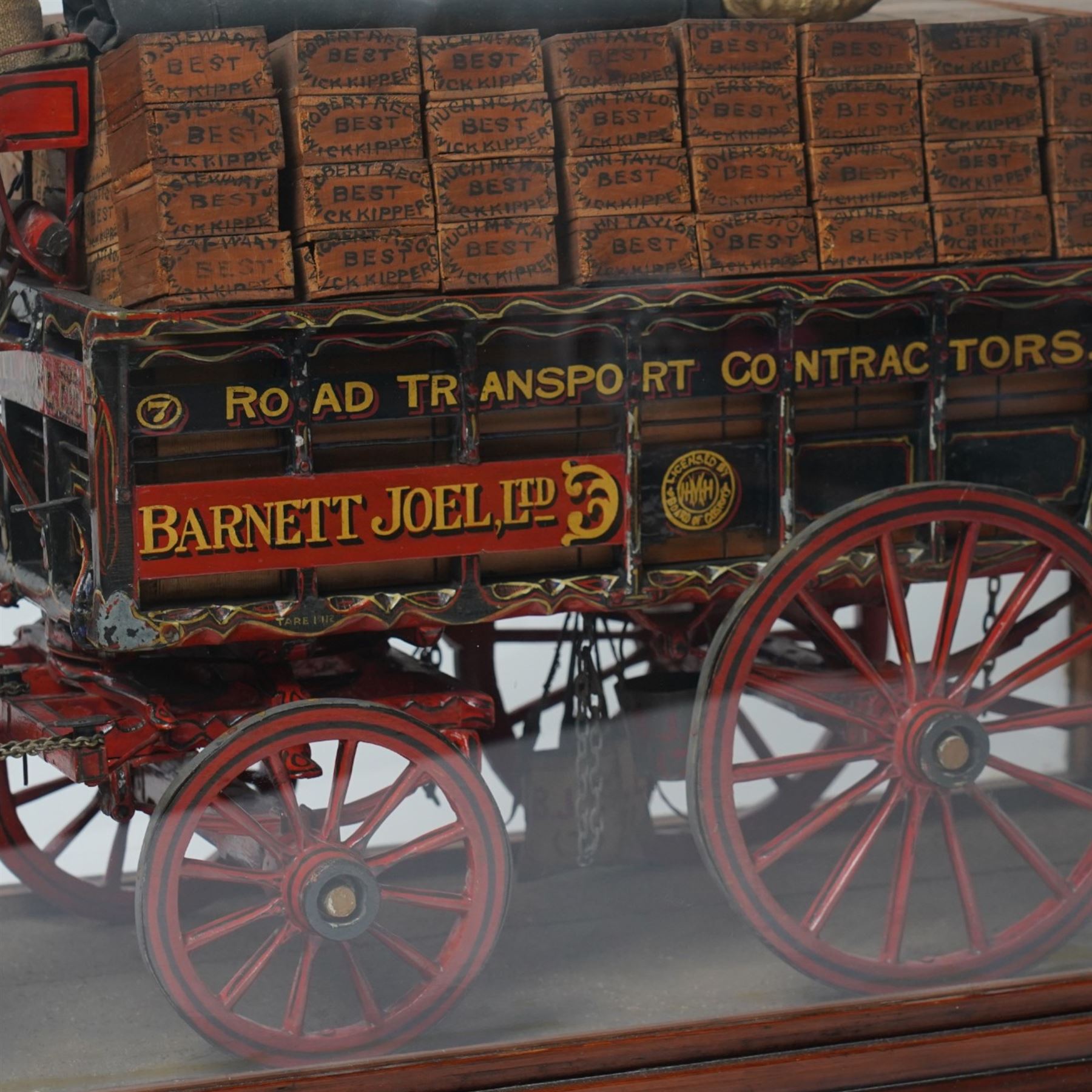 Victorian scratch built advertising model for Barnett Joel Ltd, by George Ivory  dated 1894, modelled as a horse drawn delivery wagon within a glazed display case, the hand painted cart laden with 'Best wick kippers' from various suppliers, pulled by two carved and dapple grey painted horses in full rig, upon a sanded base, with hand written makers label