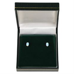Pair of 9ct gold opal earrings, boxed