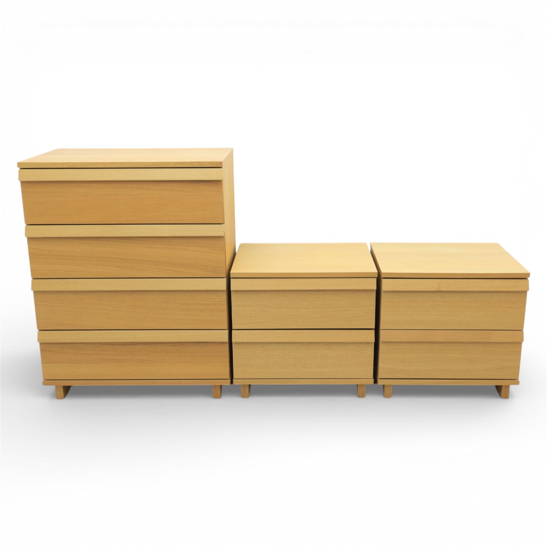 Ikea - 'Oppland' modern oak veneered chest of drawers and a pair of matching bedside chests, with moulded handles across the full width of the drawer, raised on block feet, Bedside tables (H 57cm, D 50cm, W 60cm) 
