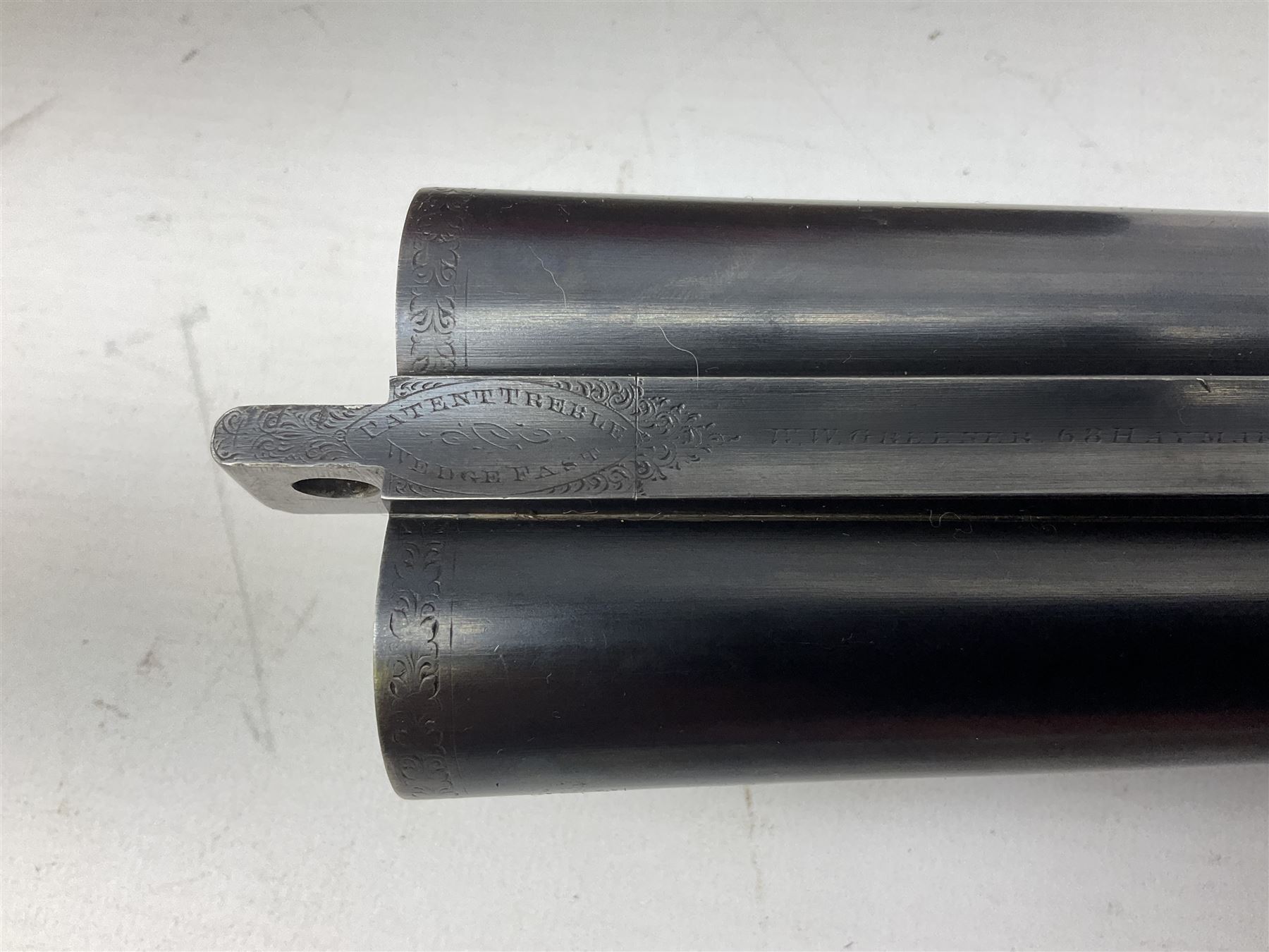 W.W. Greener 12-bore side-by-side double barrel non-ejector shotgun, with 76cm barrels, side safety, engraved lock, figured walnut stock with chequered grip and fore-end, no.33408, 120.5cm overall; in fitted canvas covered case with tools and accessories including .22 12-bore dog training device. SHOTGUN CERTIFICATE REQUIRED.