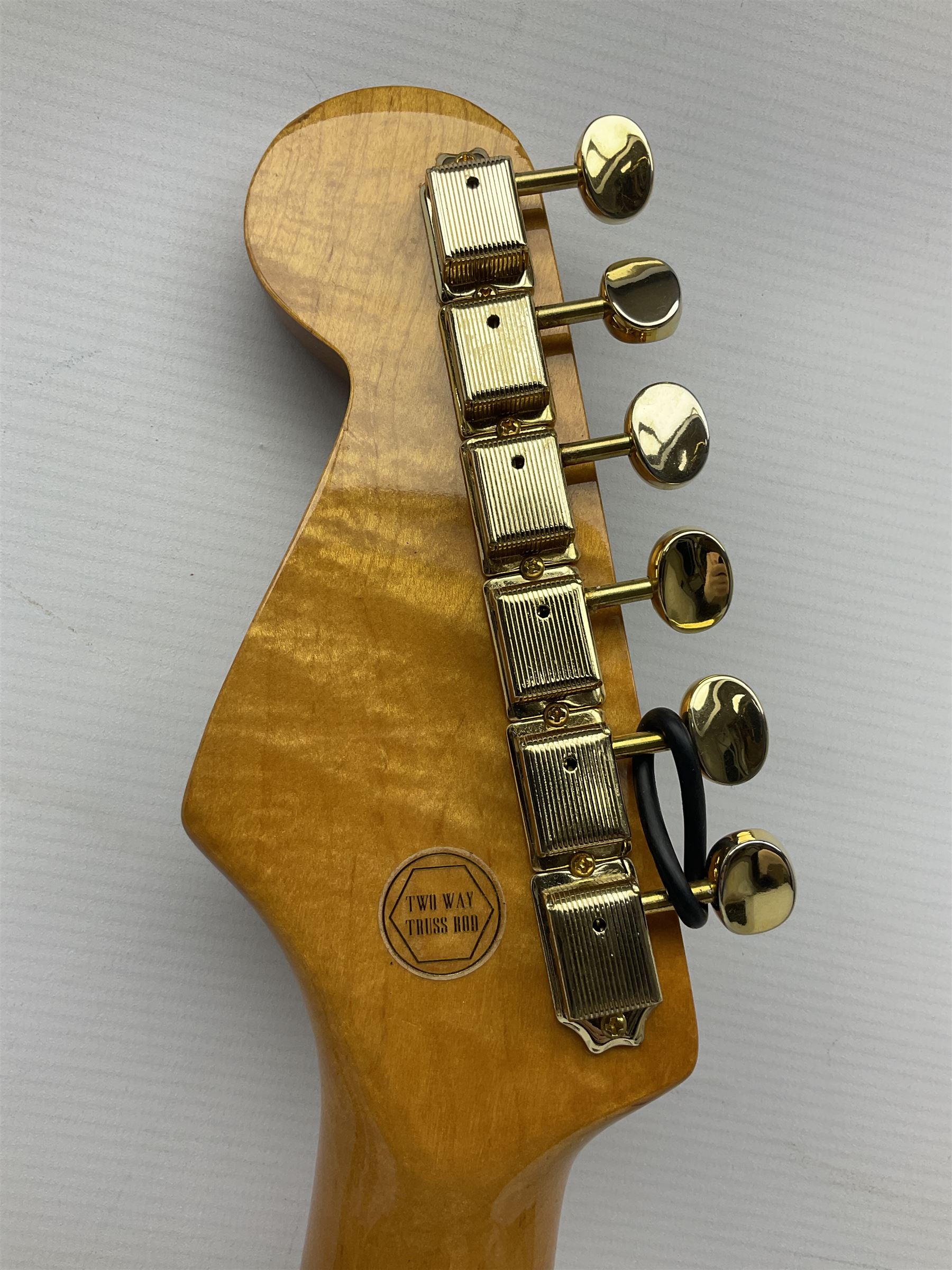 Fender Stratocaster style electric guitar in metallic blue with Rio Grande pick-ups and Fender back-plate L98cm; in Fender soft carrying case