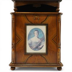 Late 19th century coin operated floor standing Polyphon, the shaped cornice marked 'Polyphon' with eleven 50cm discs in a walnut case with glazed upper section, the coin slot marked '1 Penny', the lower section with fall front for disc storage and inset with a portrait print and on compressed bun feet H230cm x W76cm x D46cm with a number of old pennies