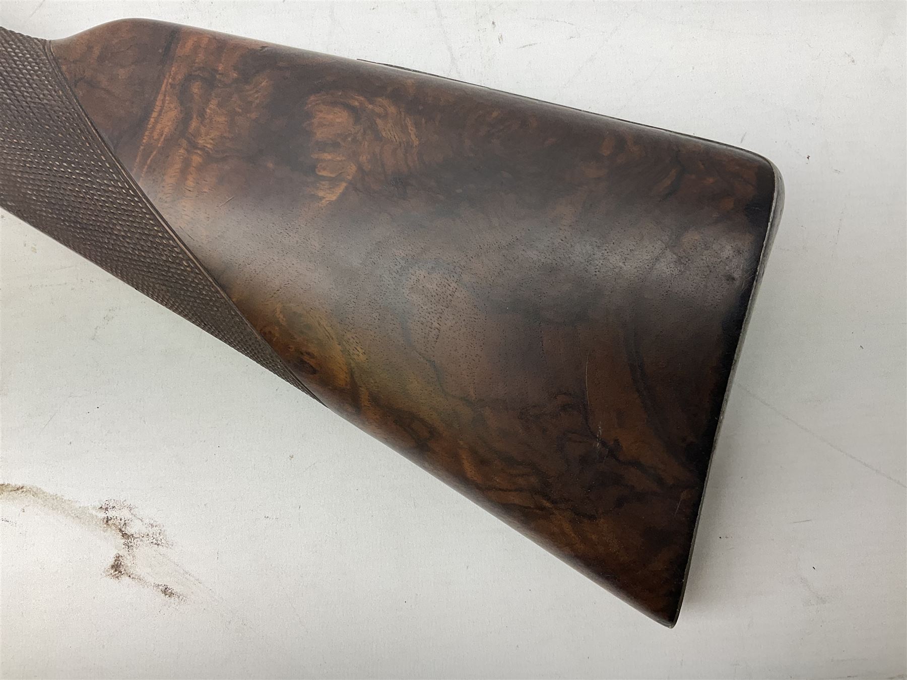 19th century John Jefferson of Scarborough 6-bore (modern 4-bore) double barrel side-by-side percussion gun, with 81cm stub twist damascus barrels (no provision for ramrod), well figured walnut stock with fine chequered grip and fore-end with horn tip and steel butt plate with long tang, well engraved lock and hammers with half-cock safeties on both sides, barrel sling swivel but rear sling swivel removed and replaced with silver escutcheon, London proofmarks, NVN, L128cm