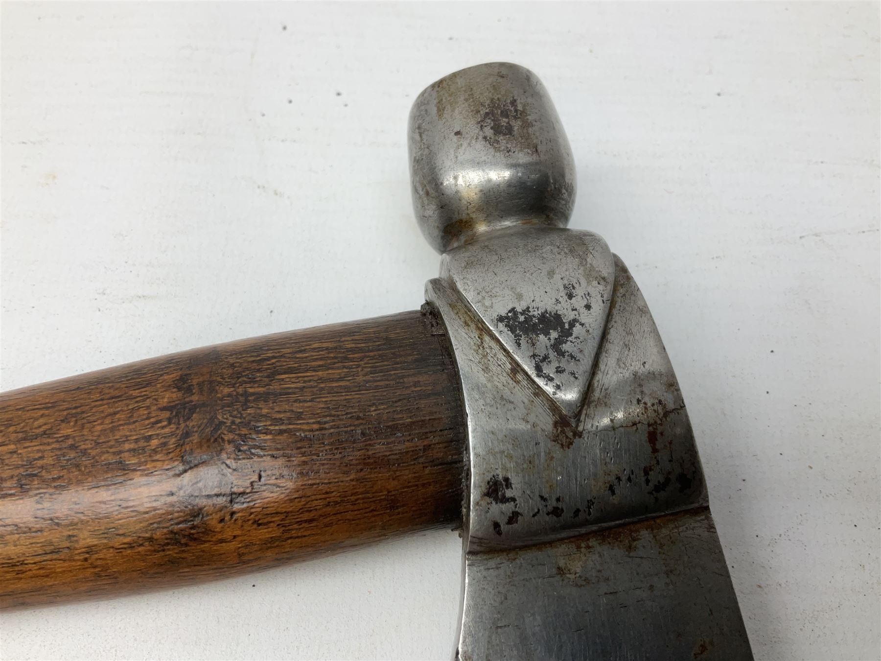 Early 20th century ceremonial Tomahawk pipe, steel axe head with pipe bowl, drilled drawing shaft, 46cm