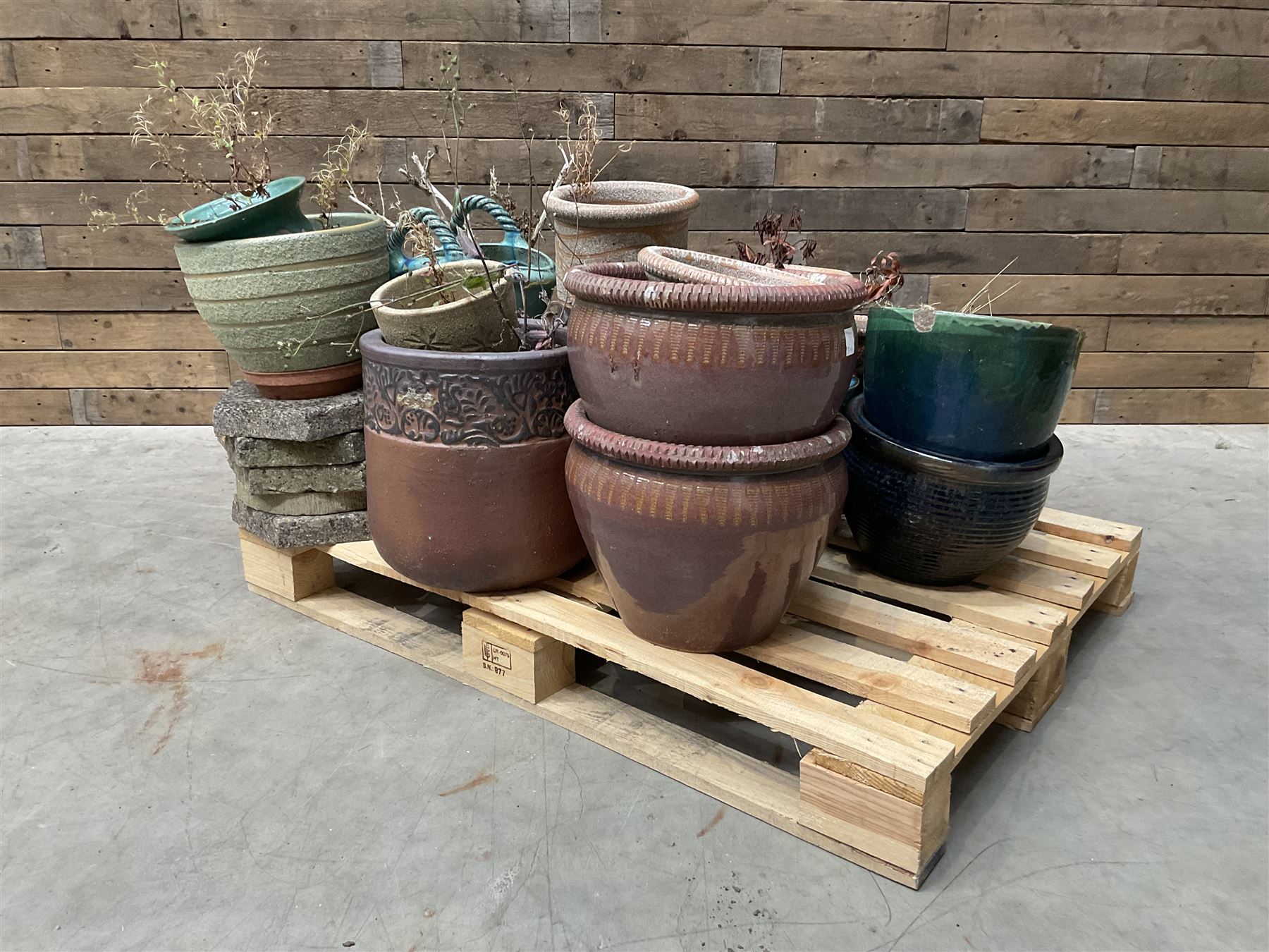 Large collection of ceramic plant pots and paving slabs, (26)